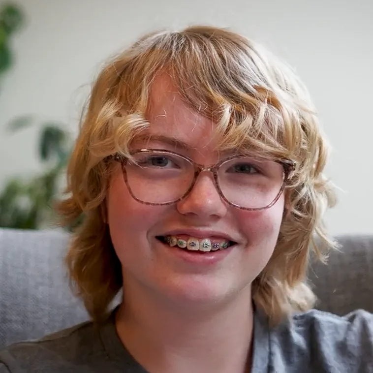 A smiling teenager
